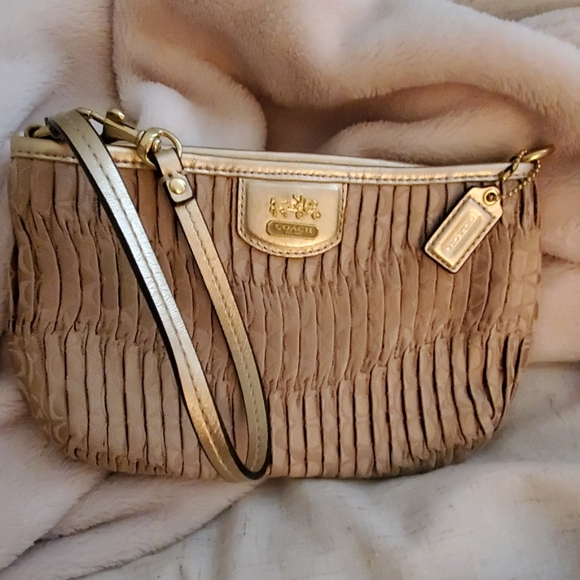 Coach Handbags - Coach wristlet gold
